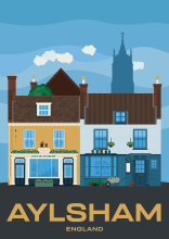 Two beautiful buildings housing a restaurant and a tea room at the Market Place of Alysham in Norfolk, England.